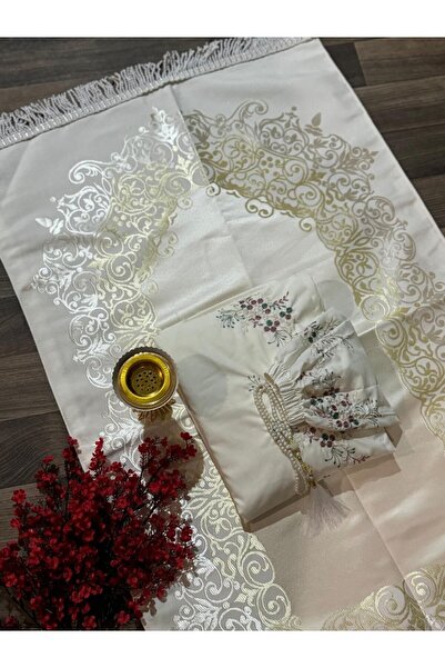 ssd A complete set including a prayer rug, prayer mat, prayer beads, rosary r...