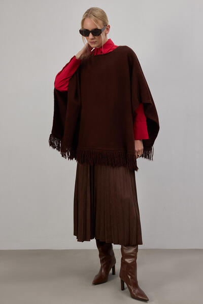 Touché Privé Fringed Knitted Poncho