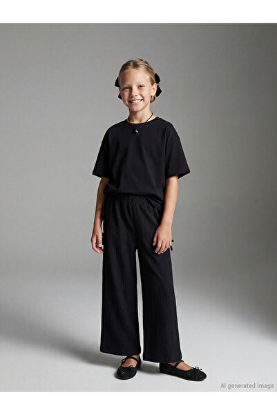 LC Waikiki Black Elastic Waist Bow Detailed Girls' Trousers