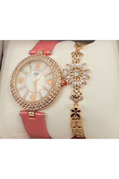 Generic HYJ women's watch, pink color with a decorative gold bezel + gold-ton...