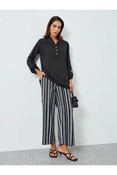 Take Two By Styli Women Black Solid Top and Striped Pants Co-Ords