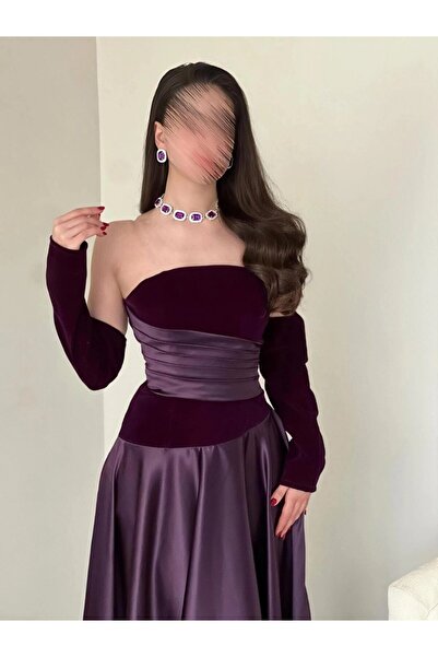 Ta Prince An elegant evening dress with a sophisticated design that highlight...