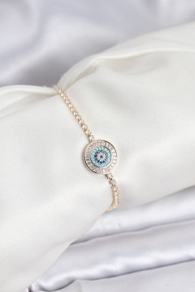 FREEDOM STOREE سوار مائي ذهبي اللون مزين بحجر الزركون على شكل عين الحسد