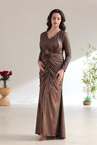 Verona Long evening dress with a bronze sheen, front pleats, and a wrap design.