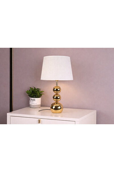 SADANHOME An elegant table lamp with warm lighting and a touch of luxury.