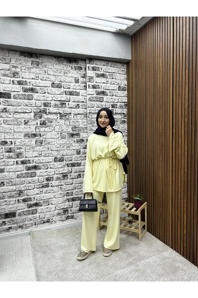 Rema Seasonal Women's Two-Piece Suit with Cuffs and Waist Detailing