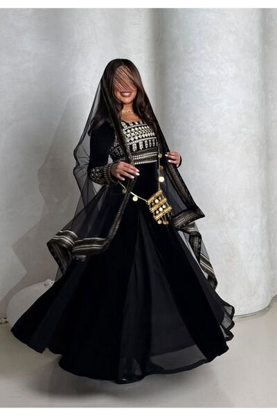 tsuwahen A luxurious black Asiri dress with intricate traditional embroidery ...