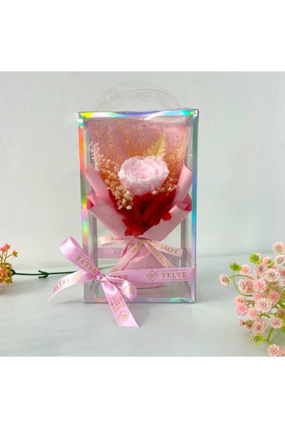 velve Floral bouquet with pink cryogenic rose, hydrangeas and fern, in a tran...