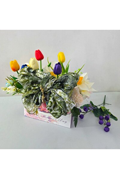 velve Decorative floral arrangement with tulips, daffodils, scarf and butterf...