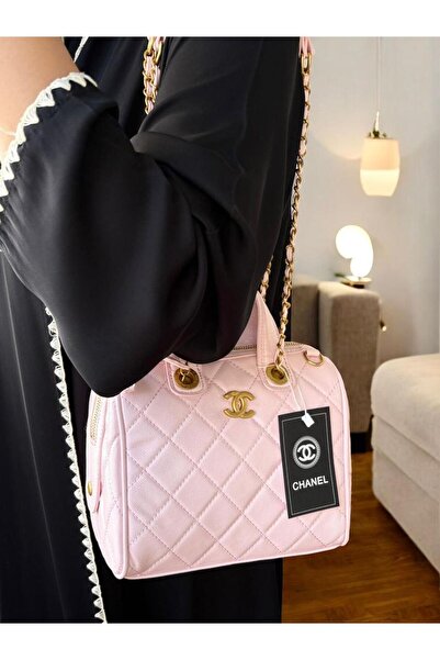 بيت الجملة (translated: House of Wholesale) evening bag