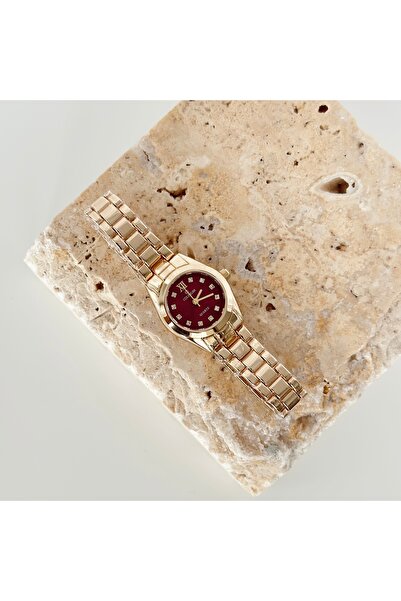 Vesce Atelier Suvis Gold Saat Bordo Translates to Suvis Gold Saat Bordo.