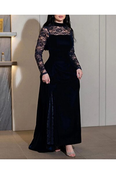 Ta Prince An elegant navy blue evening dress with a sophisticated design that...