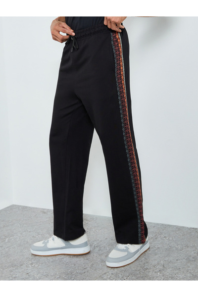 Styli Men Black Oversized Terry Printed Panel Joggers