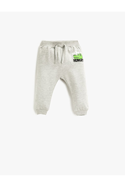 Koton بنطال رياضي بطبعات مع حزام خصر