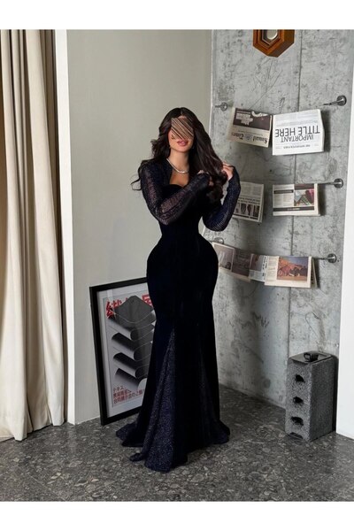 Ta Prince An elegant navy blue evening dress with a long design that accentua...