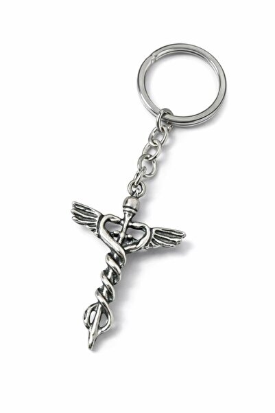 HER ŞEY NOTA www.herseynota.com Breloc unisex de culoare argintie cu figurină...