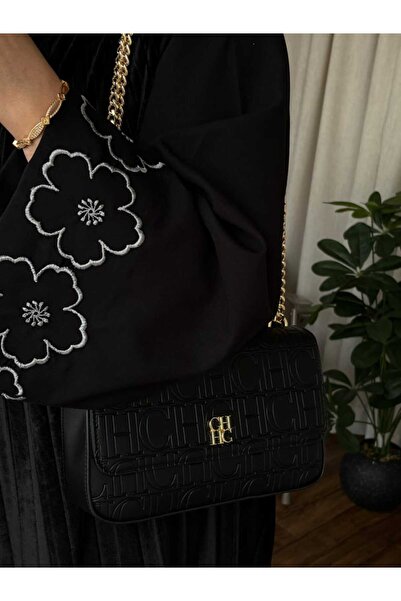 بيت الجملة (translated: House of Wholesale) Sahar's bag