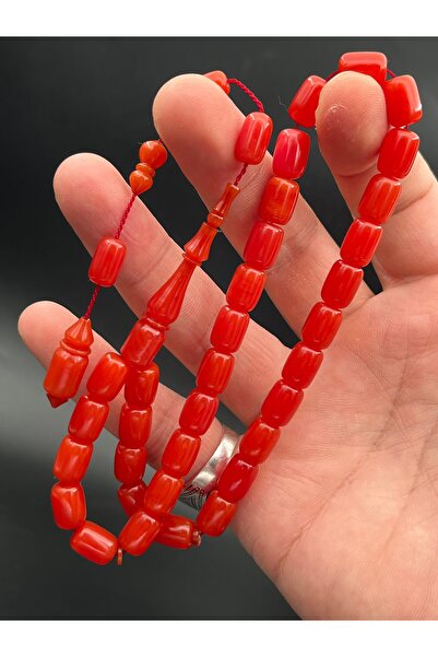 Cemhan Göksal سبحة من حجر العنبر الناري، قطع كبسولي، مقاس 7×10 ملم