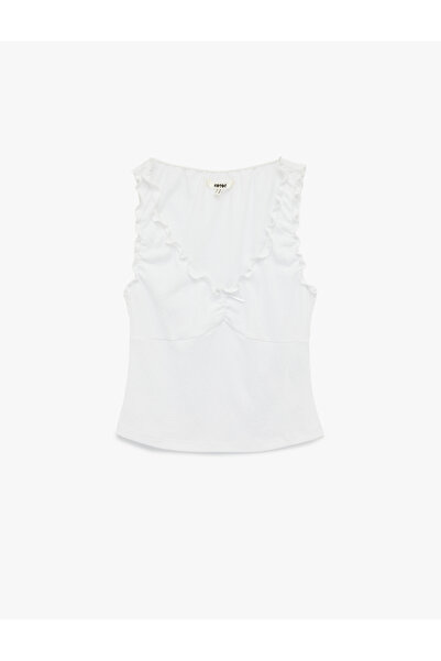 Koton Αμάνικη μπλούζα από ύφασμα μπουρούμικ με λαιμόκοψη V και φιόγκο με βολάν