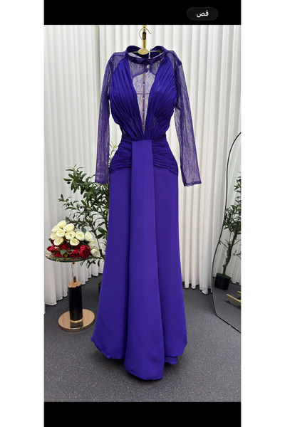 AREEJ FASHION A long evening dress with an elegant design and a luxurious pur...