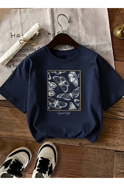 caddekombin تي شيرت نسائي ذو إطار ذهبي ونمط الفراشة باللون الأزرق الداكن