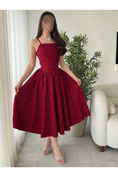 TARFA A dress that combines the charm of classic style with the vibrancy of t...