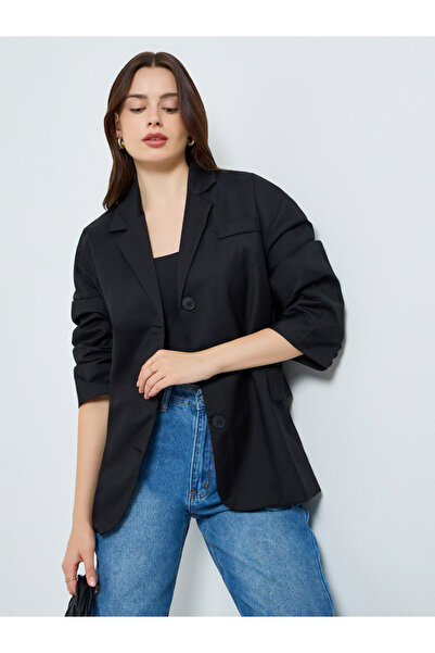 Styli بليزر نسائي أسود بأزرار أمامية