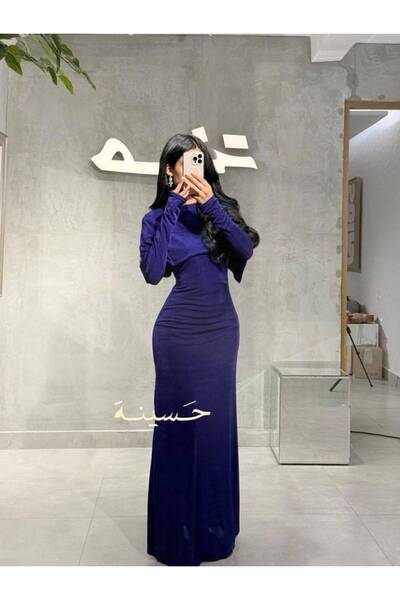 hasinah A flowing, velvety purple dress