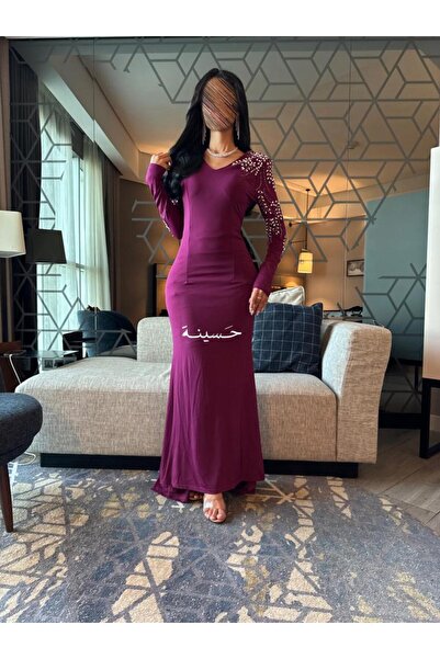 hasinah A dress that shimmered in royal purple