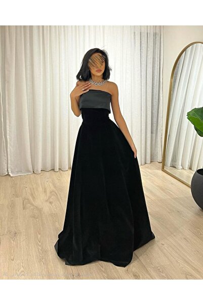 TARFA This dress combines simplicity of design with luxurious fabric, as it c...