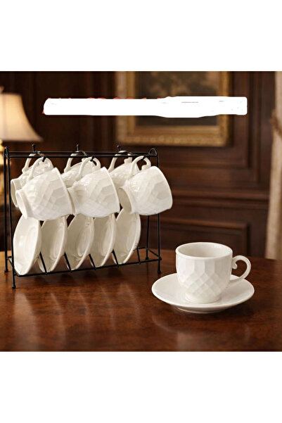 Gerenic White ceramic coffee/tea set with a prominent geometric design, inclu...