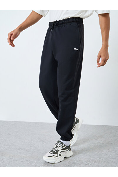 Styli Men Black Solid Fleece Oversized Joggers