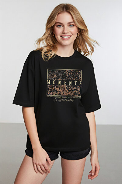 caddekombin Γυναικείο μπλουζάκι με λεοπάρ σχέδιο και χρυσό περίγραμμα σε μαύρ...