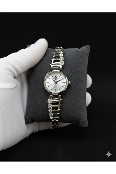 Butik GÜMÜŞ RENK TAŞLI KADIN KOL SAATİ KRİSTAL DETAYLI ÖZEL TASARIM İNCE KORD...