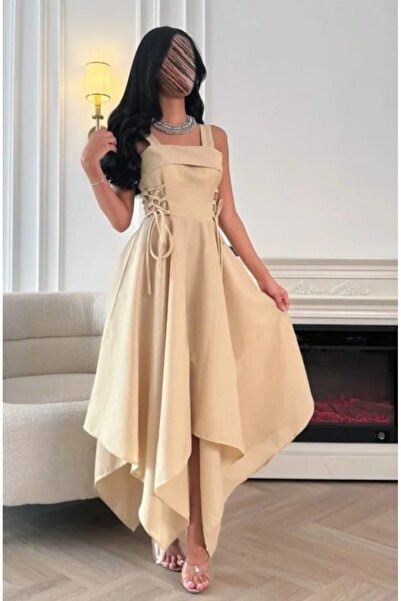 TARFA This dress comes in a warm "creamy beige" color that gives you a natura...