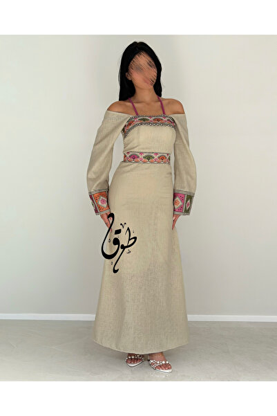toog A modest beige evening dress with luxurious traditional embroidery