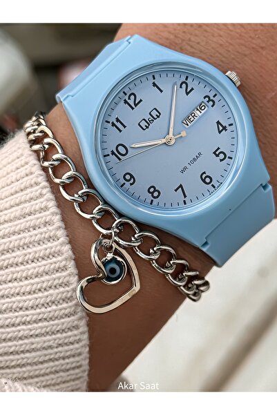 Q&Q Women's Sports Wristwatch Bracelet with Blue Color Silicone Cord - Sea an...