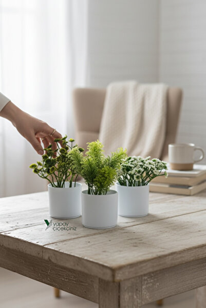 YAPAY ÇİÇEKÇİNİZ مجموعة من 3 زهور صناعية في أواني بيضاء صغيرة