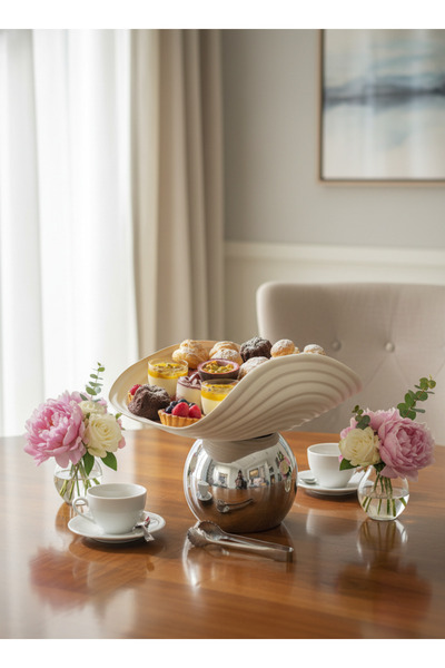 Living Metal Candy Serving Plate with Oval Curved Design and Silver Ball Base
