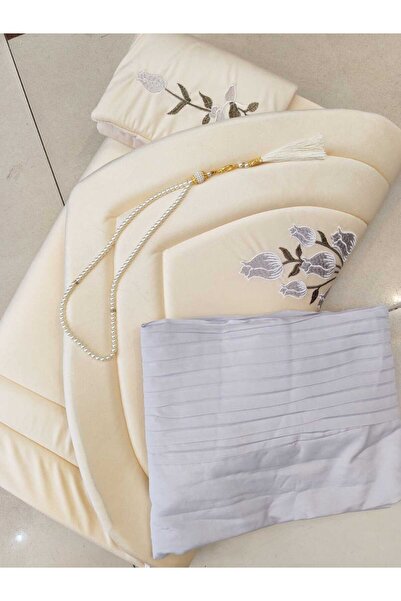 Azyaa Al-Amira A luxurious women's prayer set available in several colors, co...