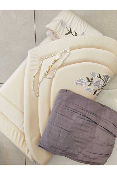 Azyaa Al-Amira A luxurious women's prayer set available in several colors, co...