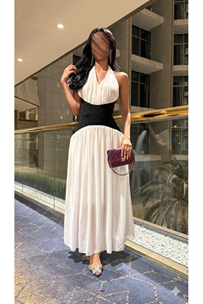 ALGOOD Modern black and white evening dress with a crepe waist and chiffon fa...