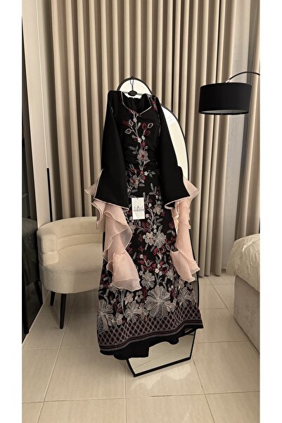 Nareen Fashion A black patterned dress with an elegant design that combines s...