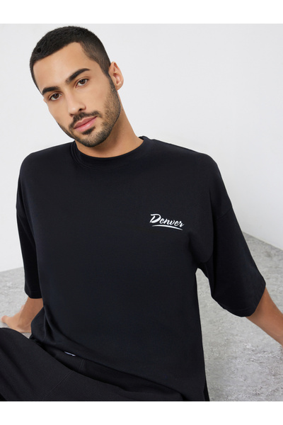 Styli Men Black Minimal Chest Print Oversized T-Shirt
