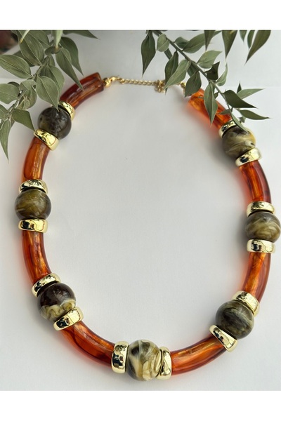 mibrillo قلادة من حجر العقيق بلونين مع تفاصيل ذهبية.