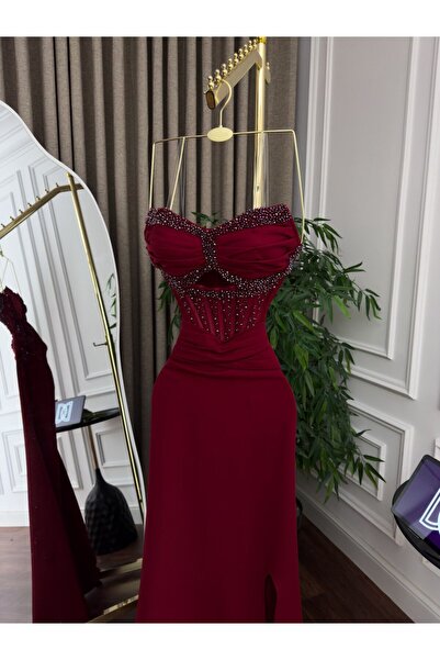 ainaqat aljawhara Evening dress with embroidered bodice