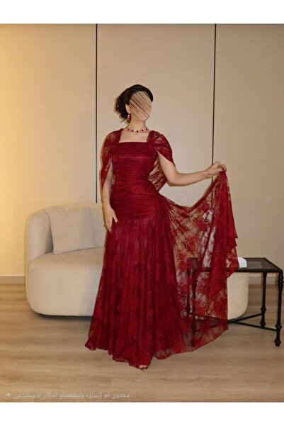 TARFA A satin evening gown overflowing with allure and luxury, designed from ...