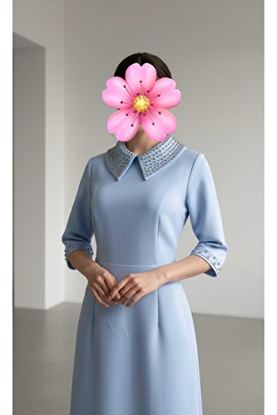 LUMY A midi dress in a calm sky blue color,