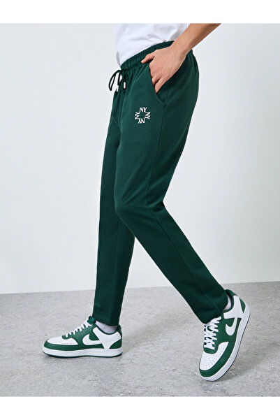 Styli Men Green Slim Fit Embroidered Joggers