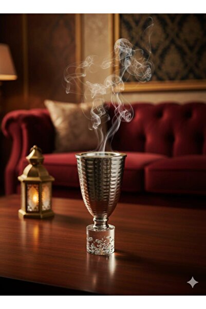 Generic A silver metal oud incense burner with a decorative (glass) base.
